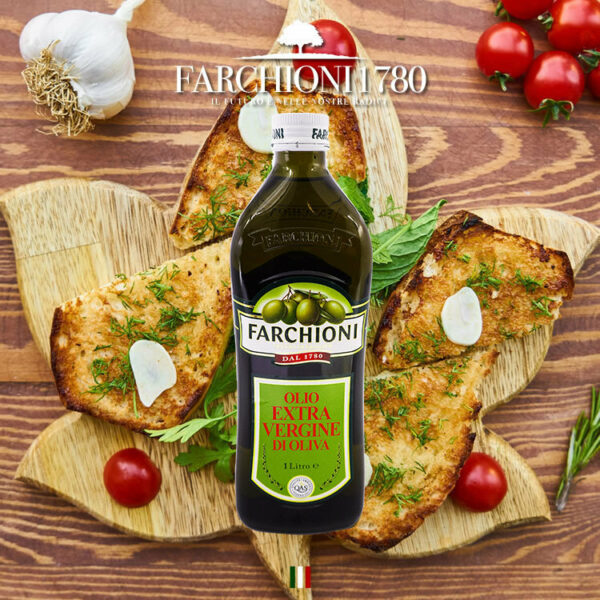 Bottle of Extra Virgin Olive Oil with Food Selection on a table